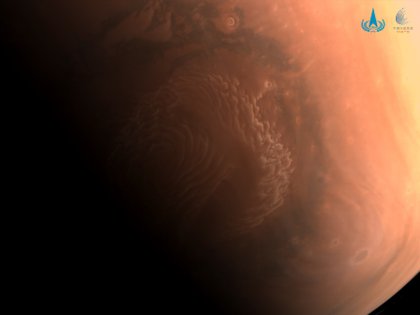 An undated handout photo made available by China National Space Administration (CNSA) on 04 March shows the surface of Mars captured from Tianwen-1 spacecraft. The picture was taken by a medium-resolution colour camera from a Tianwen-1'Äôs parked orbit, and it shows the north pole of Mars. EFE/EPA/CHINA NATIONAL SPACE ADMINISTRATION / HANDOUT -- MANDATORY CREDIT -- HANDOUT EDITORIAL USE ONLY/NO SALES
