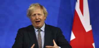 Britain's Prime Minister Boris Johnson speaks during a media briefing on COVID-19 from Downing Street's media briefing room in London, Monday March 29, 2021. (Hollie Adams/Pool via AP)