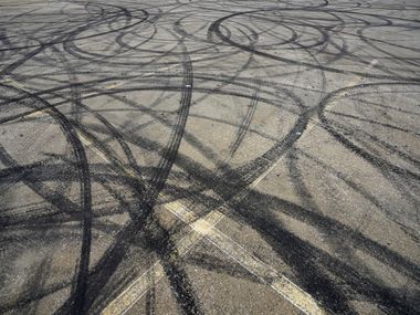 Skid marks are seen in a parking lot at 1400 S. Henderson Avenue on Monday, March 9, 2020, in Dallas.