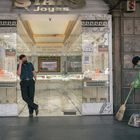 A municipal worker sweeps the sidewalk next to a jewelry shop in Mexico City, Mexico, on Friday, April 23, 2021. The Covid-19 pandemic has sent a wave of poverty racing across Latin America, deepening declines that began over the past decade and consigning millions to lives of deprivation. Photographer: Luis Antonio Rojas/Bloomberg