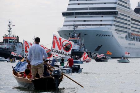 Venice residents hold a protest to demand an end to cruise ships passing through the lagoon city, as the first cruise ship of the summer season departs from the Port of Venice, Italy, June 5, 2021. REUTERS/Manuel Silvestri TPX IMAGES OF THE DAY