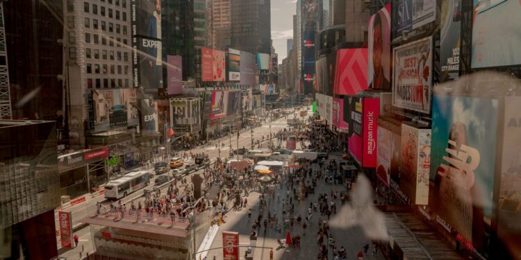 Pedestrians in the Times Square neighborhood of New York, U.S., on Saturday, Sept. 4, 2021. This month, as Broadway theaters, Lincoln Center, and other stages reopen, New Yorkers will see if the city's famous love for the arts has held strong enough to play a starring role in its economic revival. Photographer: Amir Hamja/Bloomberg