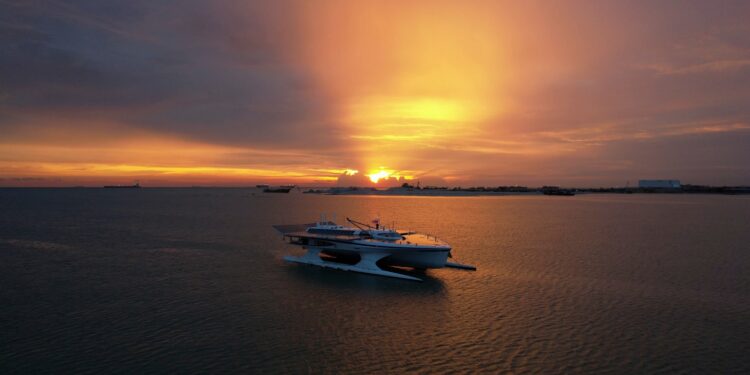 a giant ship in the middle of a sunset
