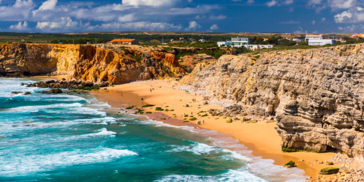 Panorama view of Praia do Tonel (Tonel beach) in Cape Sagres, Algarve, Portugal. Praia Do Tonel, beach located in Alentejo, Portugal. Ocean waves on Praia Do Tonel beach. View from Sagres fortress.