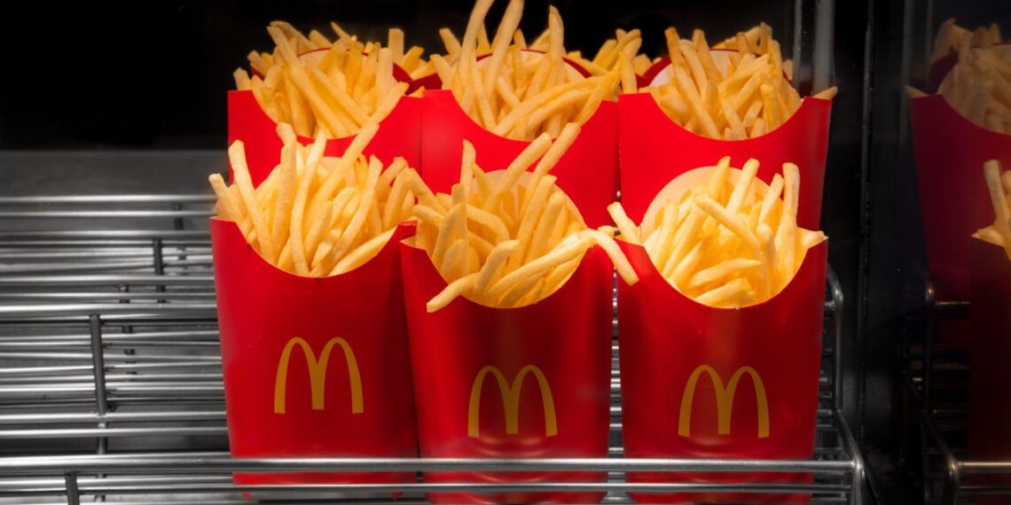 McDonald's French fries in the French fries box on warmer