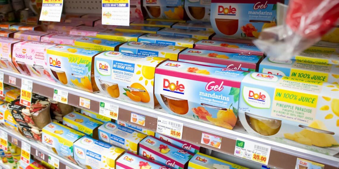 Dole fruit cups on a grocery store shelf, representing the Dole settlement.
