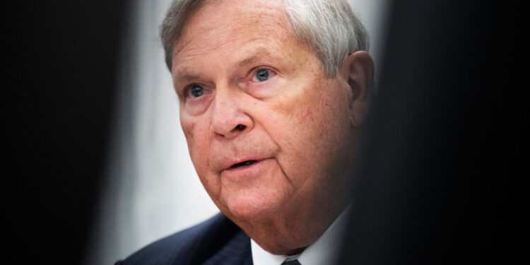 Agriculture Secretary Tom Vilsack said Monday that 50,000 USDA workers would be furloughed, affecting spending in the communities where they work and loans to farmers.