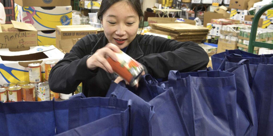 Danbury nonprofit packs up Thanksgiving meal items for needy families