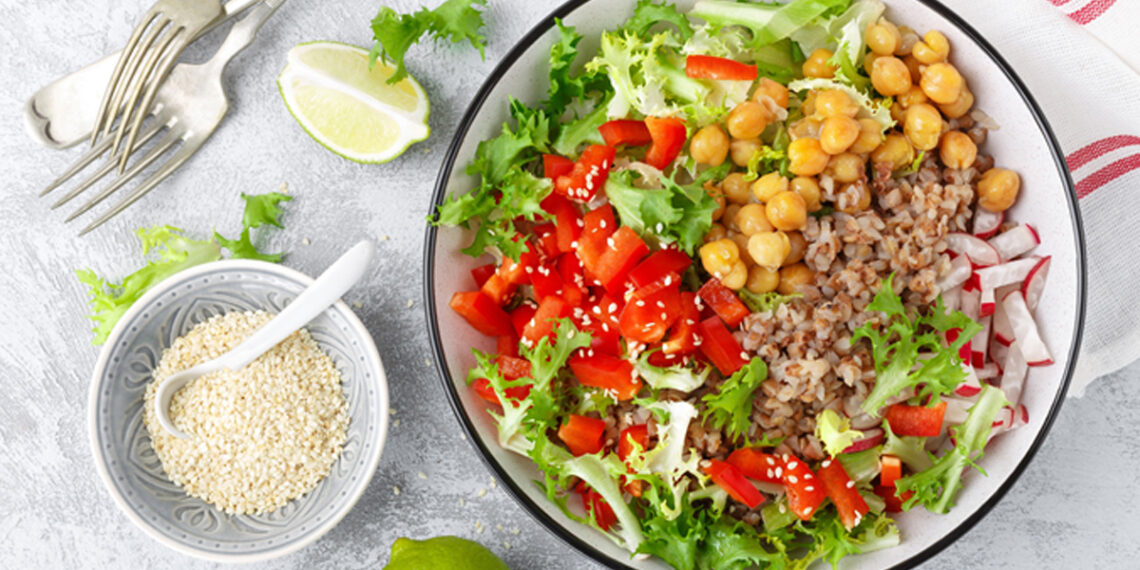 a bowl with salad and chickpeas