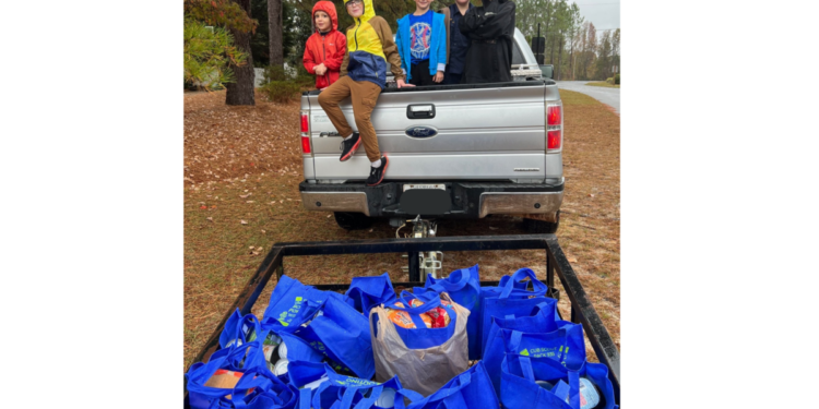 Scouting for Food: Cub Scouts work with local neighborhoods to provide bounty for food pantry
