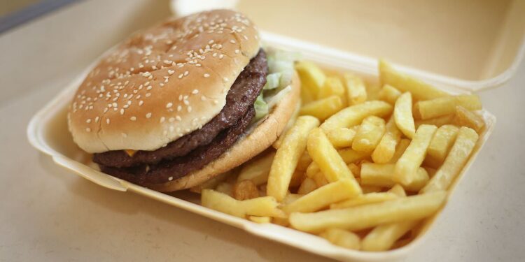 Giving children food high in calories, fat and sugar...