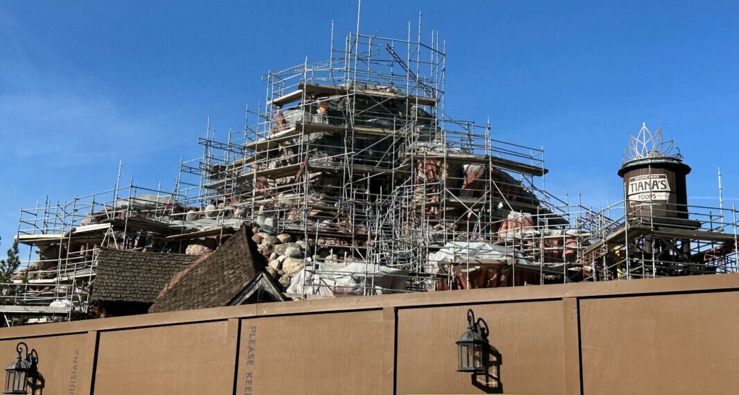 Scaffolding around mountain and Tiana's Foods water tower