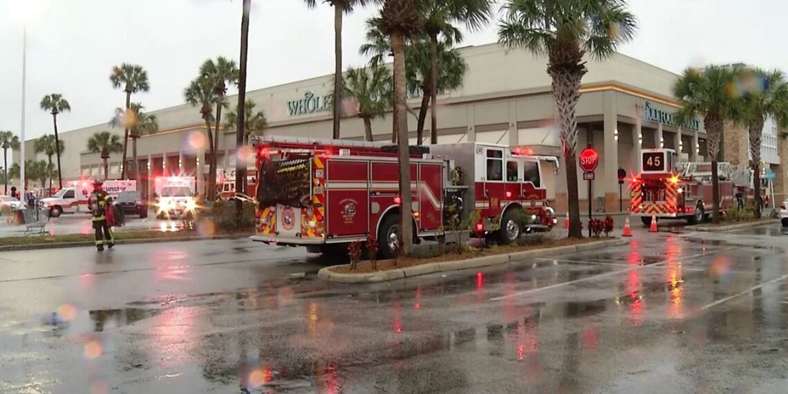 Fire engines and ambulances sit outside a Whole Foods Market at Countryside Mall in Clearwater. (Spectrum News/Randy Levine)