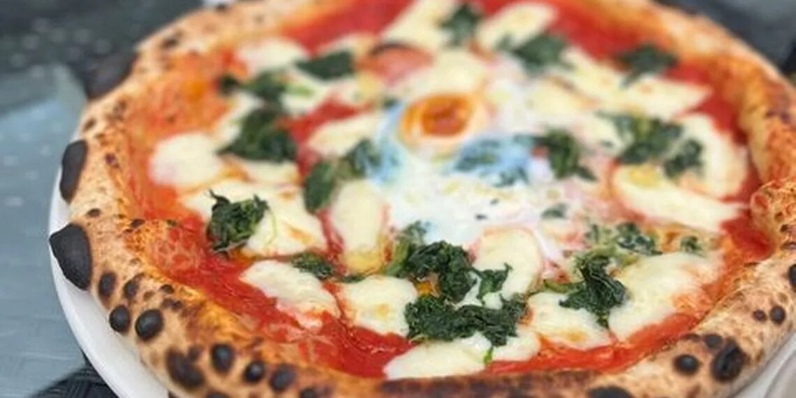 Dog-friendly pub near stunning parks with 'perfect pizzas' reopens in trendy Surrey village