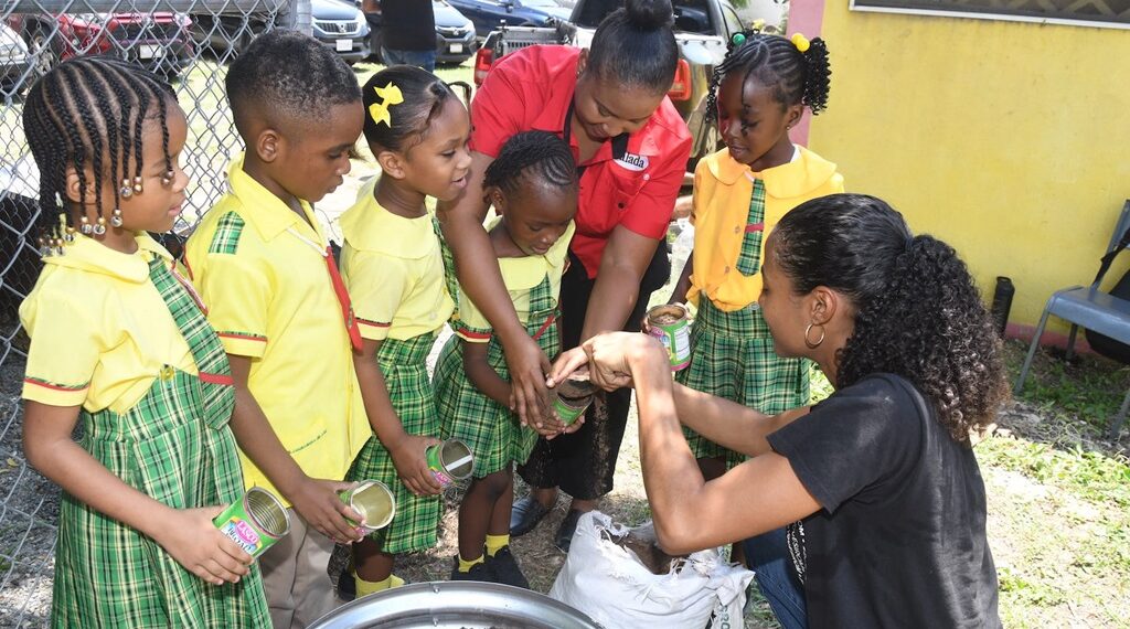 Salada Foods cultivates literacy through garden learning