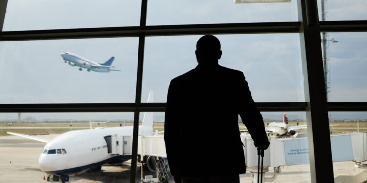 airplane travel or silhouette man watch plane fly 2023 11 27 05 19 24 utc