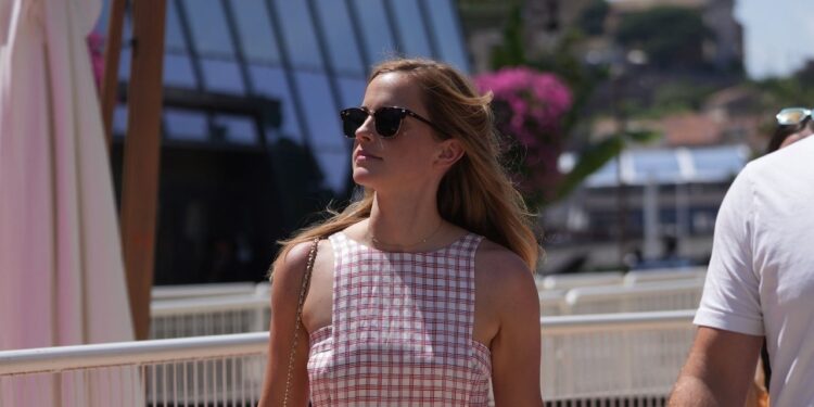 Emma Watson Models Transseasonal Dressing in a Summery Dress and Wintery Boots