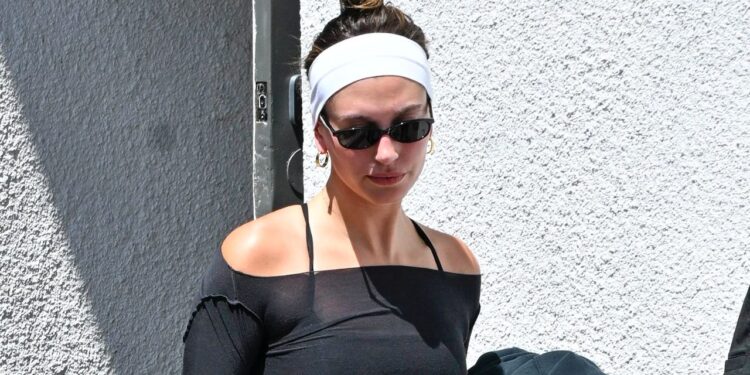 Hailey Bieber Adds Husband Justin’s Sold Out Slippers to Her Pilates Uniform