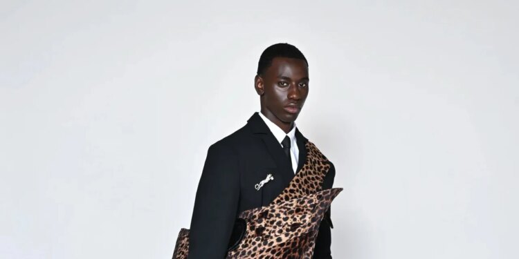 The Designer Behind Congo’s World Cup Leopard Suits Travels To See the Team Make History