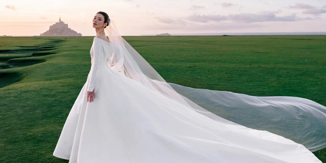 Model Ming Xi Wore a Custom Dior Haute Couture Dress to Marry at Mont Saint-Michel in Northern France