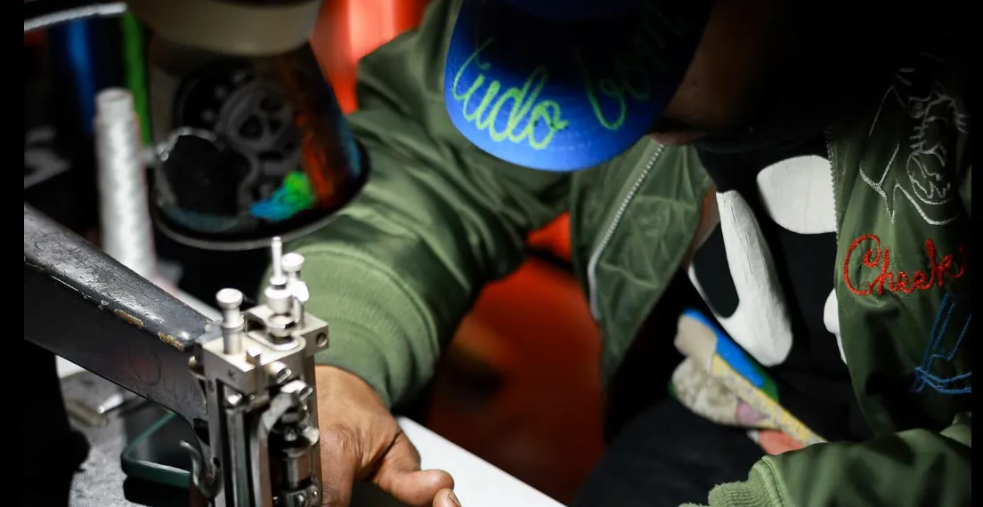 The New York Artist Embroidering Knicks Merch on the Street