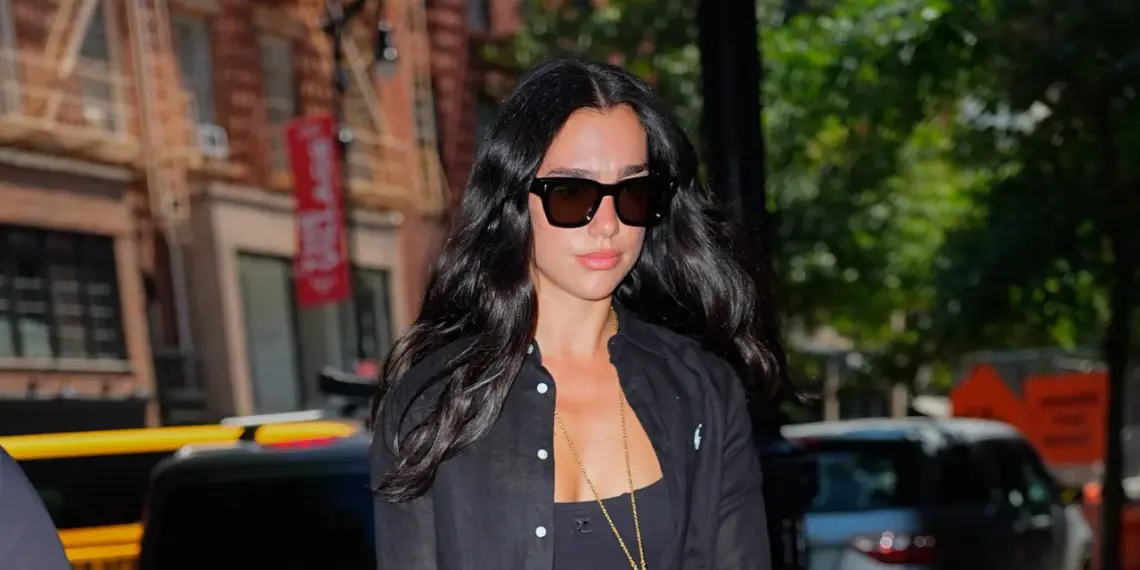 Dua Lipa Is Living a Charmed Life—With a Bag to Match