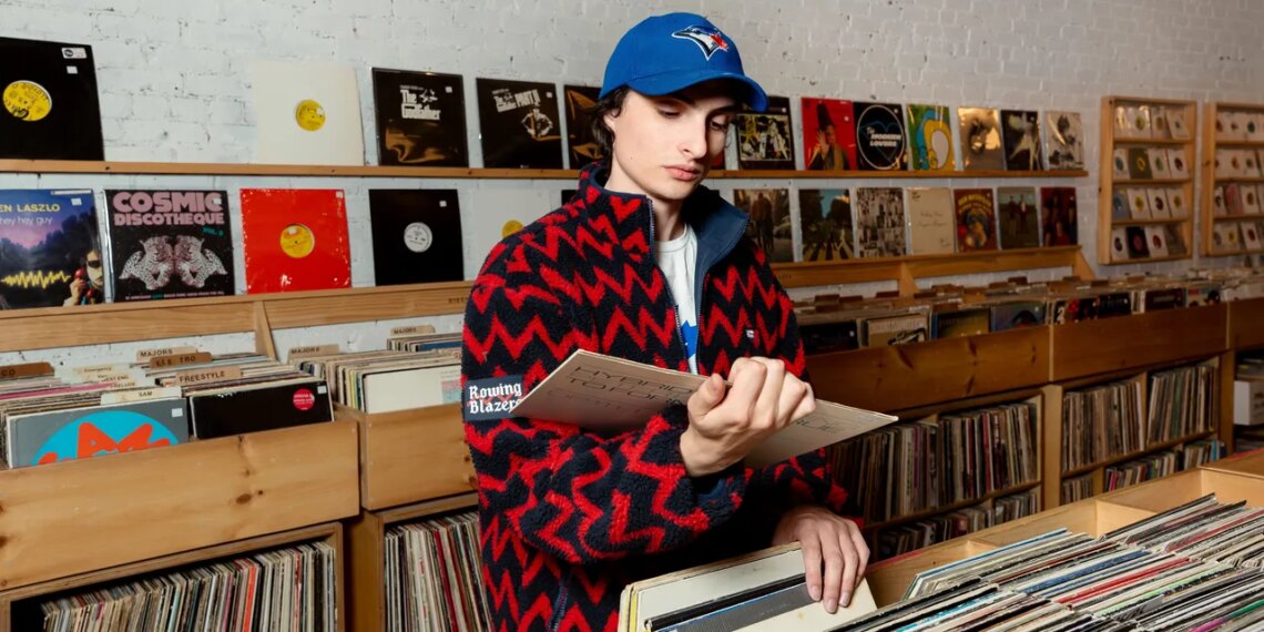 Ahead of His New Album, Finn Wolfhard Goes Record Shopping With Vogue